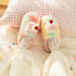 Cherry Topped Fuzzy Cake Slippers